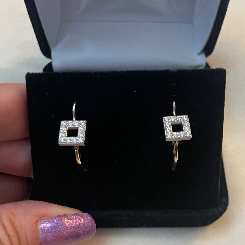 14kt White Gold & Diamond earrings from Johnson Jewelers.